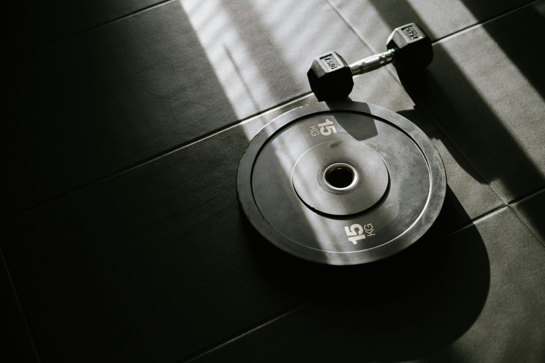 Olympic vs Standard Weight Plates - What’s Best for Your Gym?